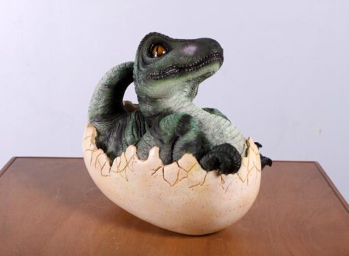 BABY T REX HATCHING JR 140034